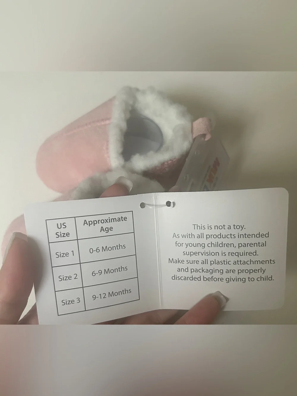 MukLuks pink baby booties 6-9M